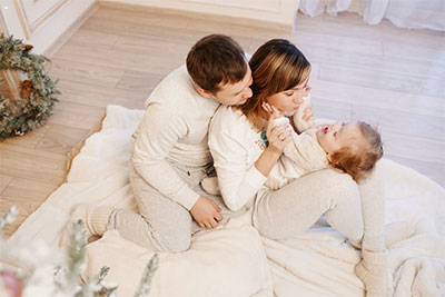 Family sitting on floor