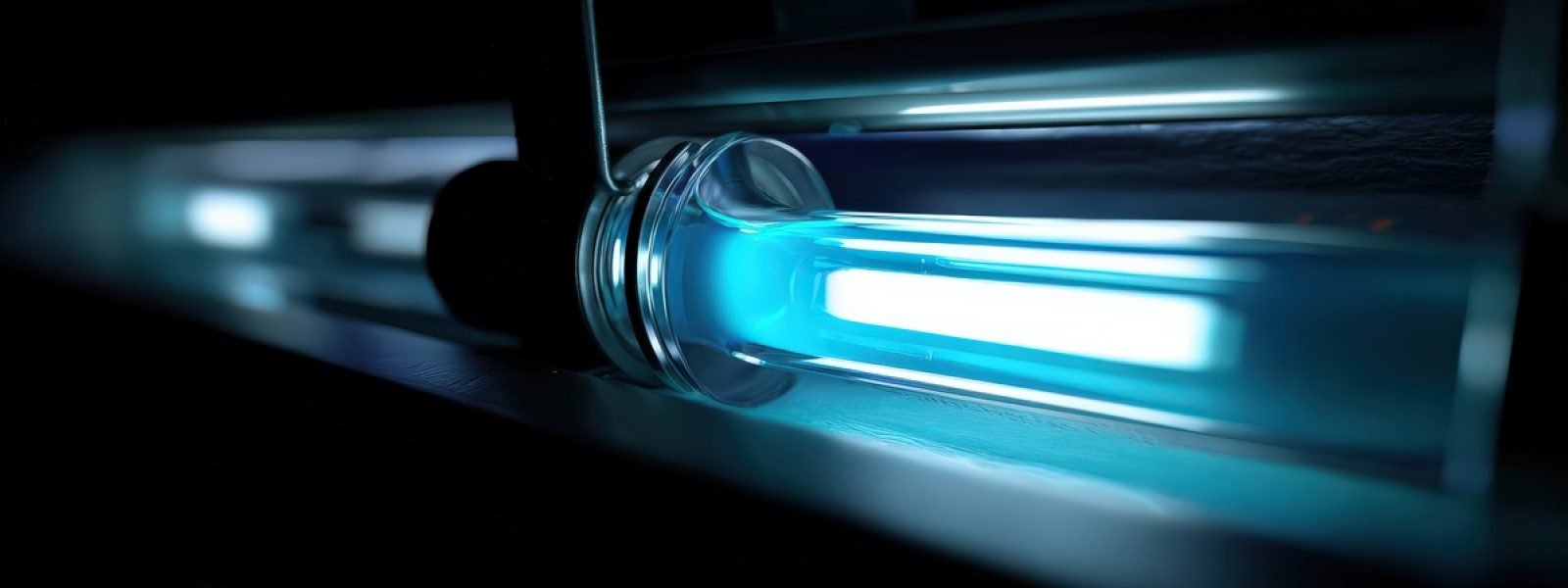 A high-tech, glowing blue ultraviolet germicidal lamp installed inside an HVAC system to eliminate bacteria.